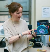 Woman teaching about HIV